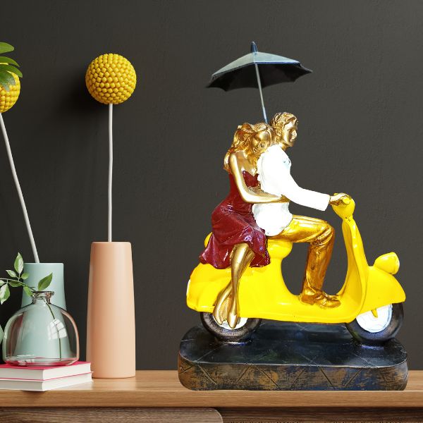 Scooter Romantic Love Couple Statue for Gift Showpiece Love Couple Showpiece for Valentine Day | Home Interior Idol  discription